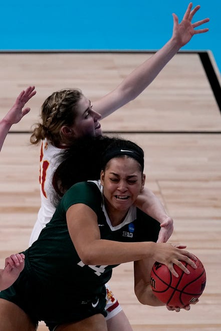Iowa State guard Emily Ryan, back, tries to steal the ball from Michigan State forward Taiyier Parks (14) during the first half.