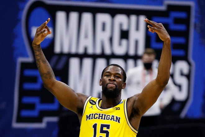 Michigan's Chaundee Brown reacts to a 3-pointer against the LSU Tigers.