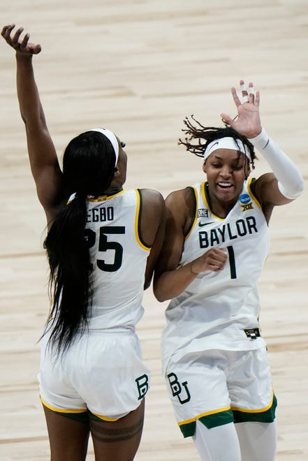 Baylor's NaLyssa Smith (1) and Queen Egbo celebrate after the win.