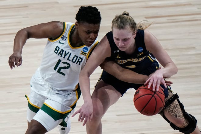 Michigan's Maddie Nolan and Baylor's Moon Ursin go after a loose ball.