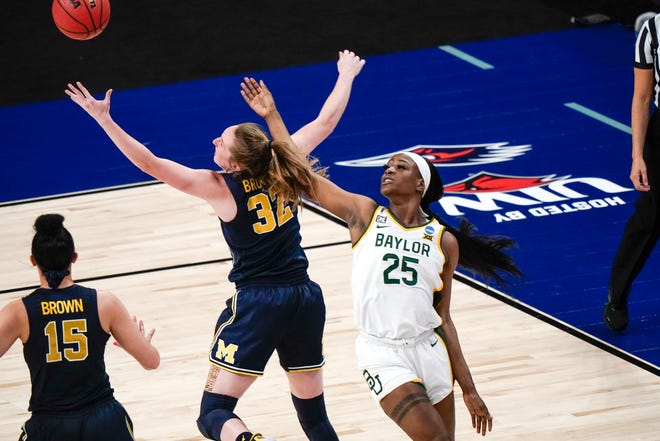 Baylor's Queen Egbo and Michigan's Leigha Brown go after a rebound.