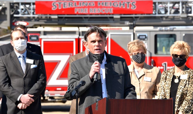 Macomb County Executive Mark Hackel addresses the media before the COVID-19 vaccination facility opens. The city of Sterling Heights, Macomb County, Shelby Township, and Silver Pine Family Physicians partner to open a new drive-thru COVID-19 vaccination facility in the former Sears Automotive Center garage at Lakeside Mall, Wednesday, March 31, 2021.
