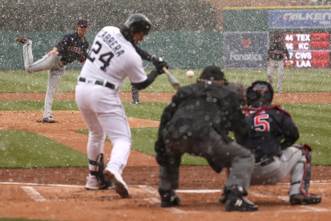 Tigers' Miguel Cabrera hits a first-inning, two-run home run off Indians pitcher Shane Bieber.