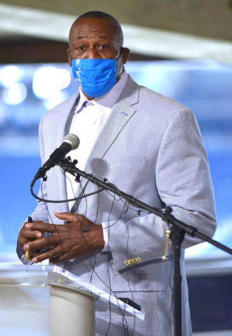 Former Detroit Lions great Lomas Brown announces the Protect Michigan Commission COVID-19 student ambassador vaccination volunteers on Tuesday, April 6, 2021. Brown is also the Lions' color commentator.