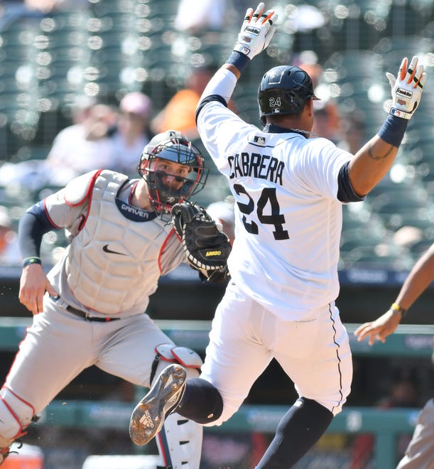 Twins catcher Mitch Garver tags Tigers' Miguel Cabrera trying to score on a fly out in the sixth inning.