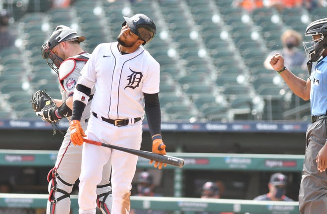 Tigers' Jeimer Candelario reacts after he strikes out swinging in the ninth inning.