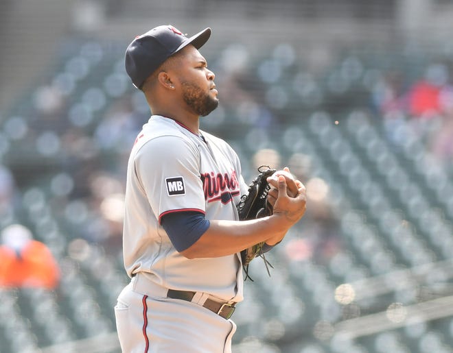 Twins pitcher Alex Colome pauses between pitches in the ninth inning.