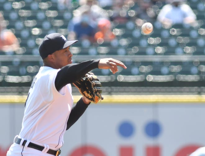 Tigers second baseman Jonathan Schoop throws to first for an out in the fifth inning.