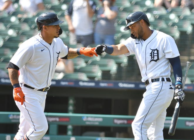 Tigers' Victor Reyes congratulates Wilson Ramos, left, after Ramos' solo home run in the fifth inning.