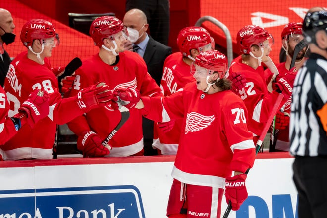 Detroit defenseman Troy Stecher celebrates the first of his two goals in the second period during a game between the Detroit Red Wings and the Chicago Blackhawks, at Little Caesars Arena, in Detroit, April 15, 2021.