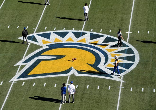 LAS VEGAS, NEVADA - DECEMBER 19:  Placekicker Matt Mercurio #39 of the San Jose State Spartans warms up on the team's logo at midfield before the Mountain West Football Championship against the Boise State Broncos at Sam Boyd Stadium on December 19, 2020 in Las Vegas, Nevada.