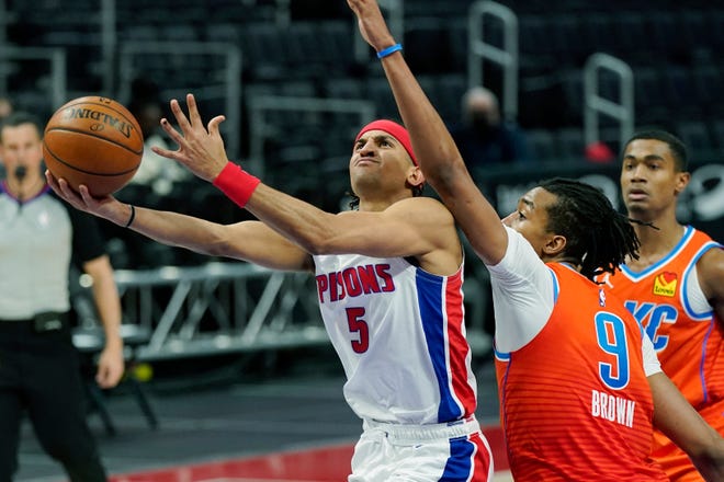 Detroit Pistons guard Frank Jackson (5) attempts a layup as Oklahoma City Thunder center Moses Brown (9) defends during the second half.