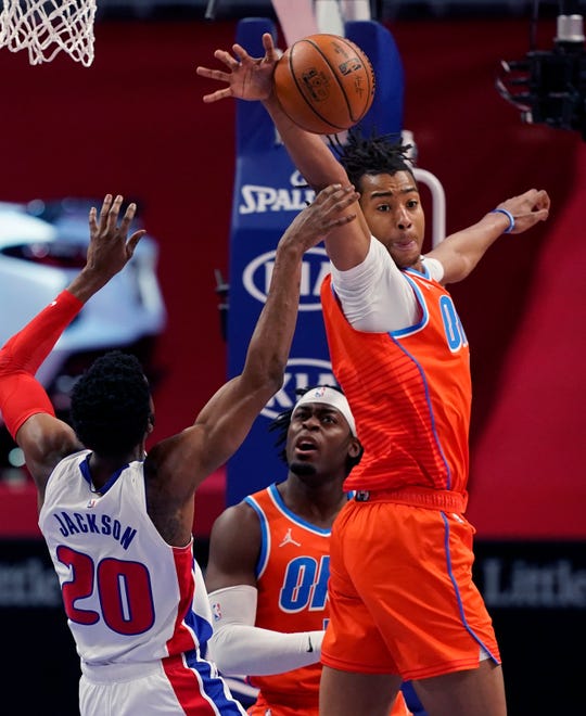 Oklahoma City Thunder center Moses Brown blocks a shot by Detroit Pistons guard Josh Jackson (20) during the first half.
