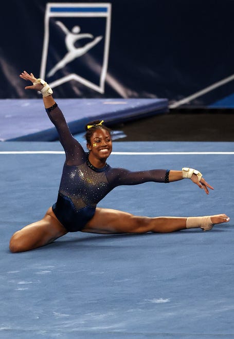 FORT WORTH, TEXAS - APRIL 17:  Sierra Brooks of the Michigan Wolverines competes in the floor exercise during the 2021 NCAA Division I Women's Gymnastics Championship.