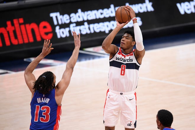 Washington Wizards forward Rui Hachimura (8) shoots against Detroit Pistons center Jahlil Okafor (13) during the first half.