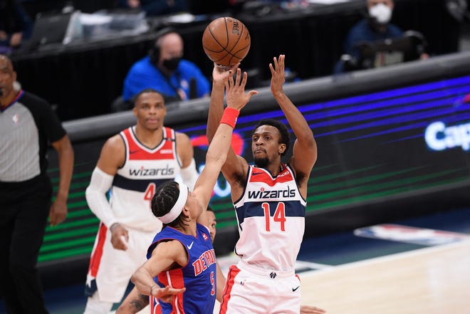 Washington Wizards guard Ish Smith (14) shoots against Detroit Pistons guard Frank Jackson (5) during the first half.
