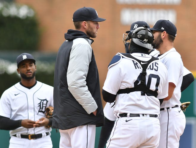 From left, the Tigers' Niko Goodrum looks on as pitching coach Chris Fetter comes out to talk with catcher Wilson Ramos and pitcher Michael Fulmer in the fourth inning.