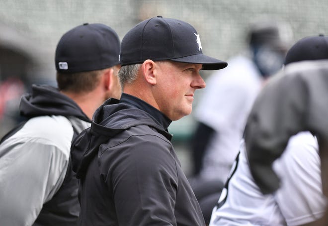 Tigers manager AJ Hinch watches from the dugout in the fourth inning.