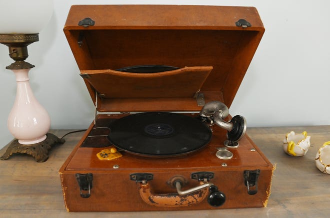 The still-working phonograph once belonged to Cindy’s grandfather who was a fan of garage and estate sales.