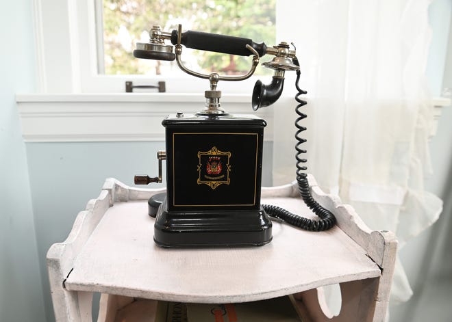 One of the many vintage telephone s found throughout the house, some of which were left by previous owners.