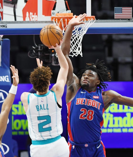 Pistons'  Isaiah Stewart defends the shot of Hornets' LaMelo Ball in the fourth quarter.