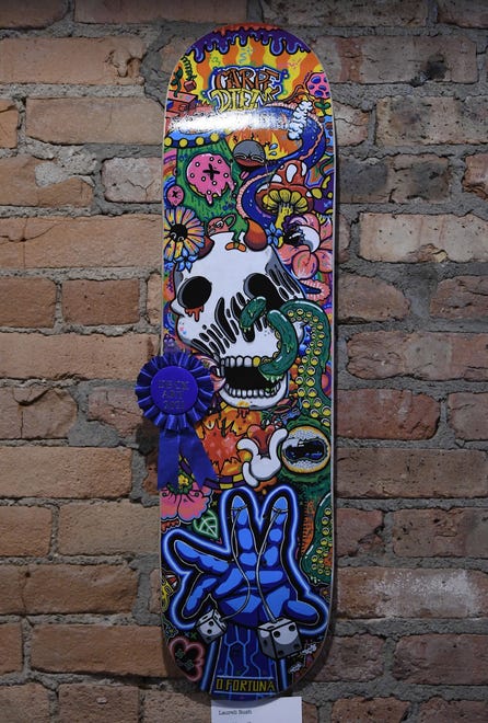 Deck Art 2021 middle school category winner Laureli Rush, 13, home schooled, and her piece titled "Freakboard."