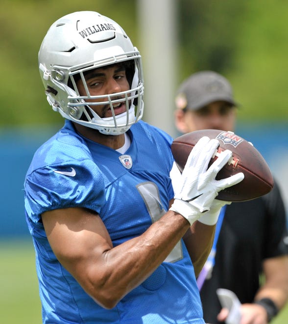 Lions wide receiver Tyrell Williams (6) secures the ball during practice.