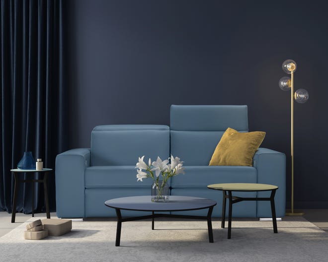 A leather sofa in a soothing shade of blue adds a pretty visual to any space. Adjustable headrests and legs make it even more appealing for those looking for more from their furniture.