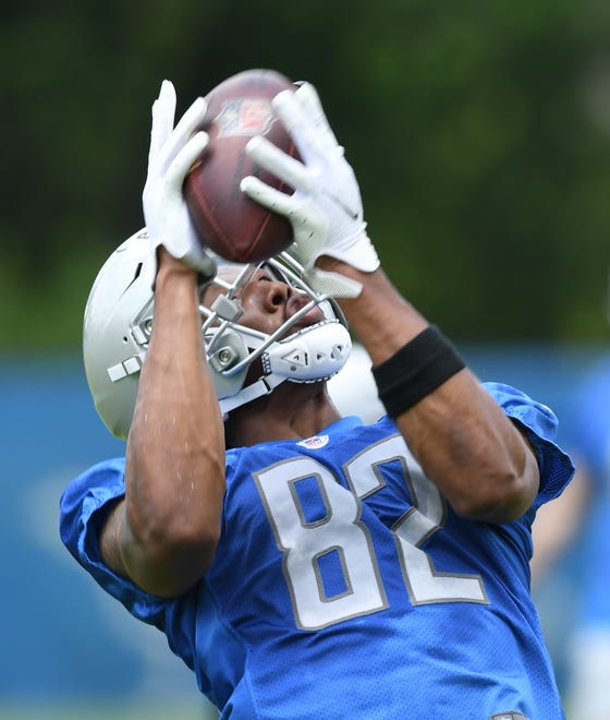 Detroit Lions rookie wide receiver Jonathan Adams pulls in a reception during drills.