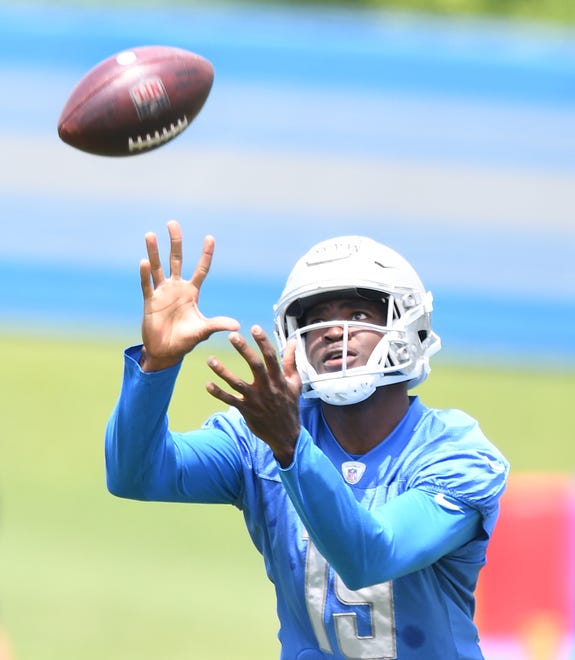 Detroit Lions wide receiver Breshad Perriman readies for a reception during drills.