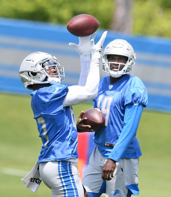 Detroit Lions wide receivers Quintez Cephus readies for a reception as Breshad Perriman looks on during drills at Lions minicamp at the training facility in Allen Park on June 9, 2021.