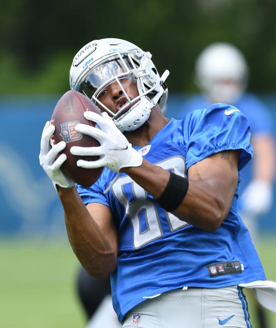 Detroit Lions rookie wide receiver Jonathan Adams pulls in a reception during drills.