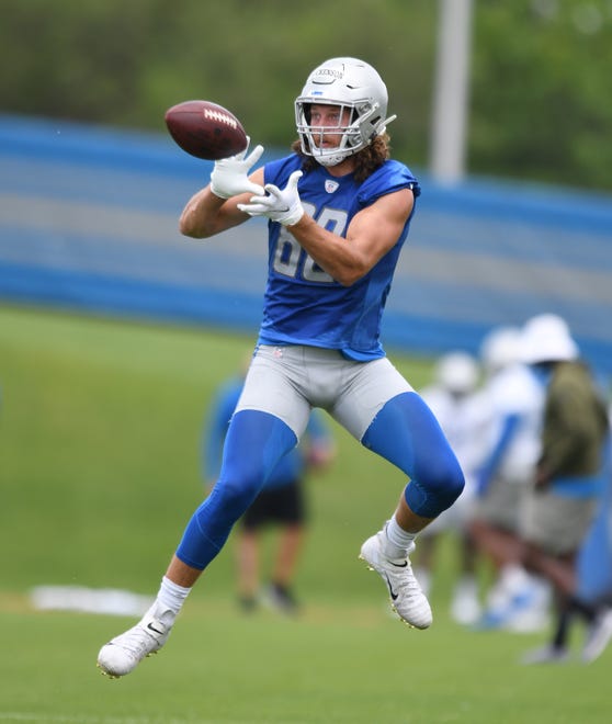 Lions tight end T.J. Hockenson pulls in a reception during drills.