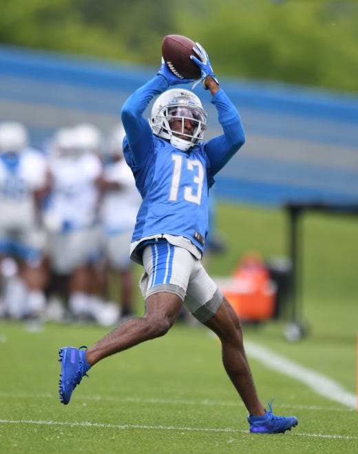 Lions wide receiver Victor Bolden pulls in a reception during drills.