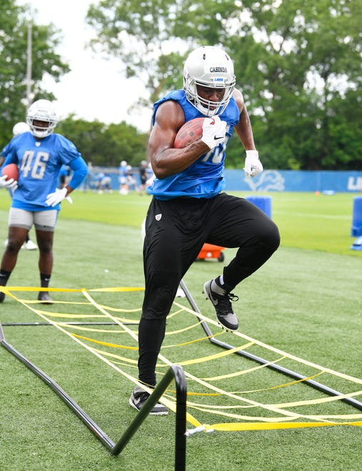Lions fullback Jason Cabinda works through the ropes during drills.
