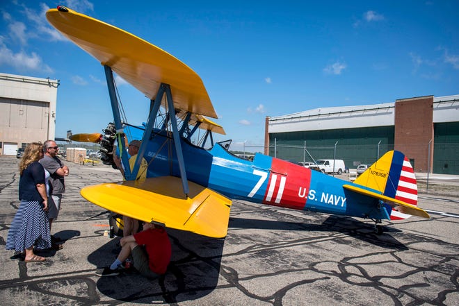 A Boeing A75N Stearman is pictured during Detroit’s Invitational Wings and Wheels classic car and aircraft show at Willow Run Airport in Ypsilanti, Mich. on June 13, 2021.