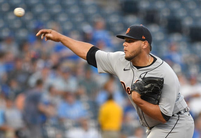 Tiger relief pitcher Joe Jimenez throws during the third inning.