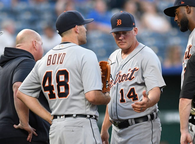 Tiger Matthew Boyd (48) comes out of the baseball game after talking to manager A.J. Hinch (14) during the third inning.