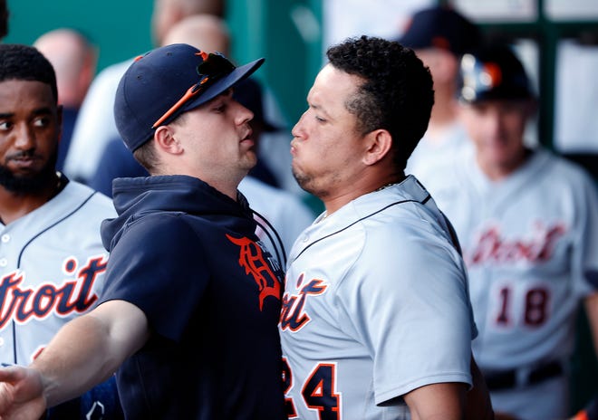 Detroit Tiger Miguel Cabrera chest-bumps in the dugout prior to the game against the Kansas City Royals at Kauffman Stadium on June 14, 2021 in Kansas City, Missouri.