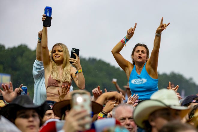 Fans enjoy the music during the Chris Lane concert at the Faster Horses music festival on July 16, 2021, in Brooklyn.