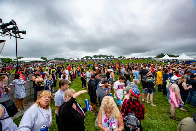 Fans gather before the country singer Carly Pearce performance at the Faster Horses music festival on July 16, 2021, in Brooklyn.