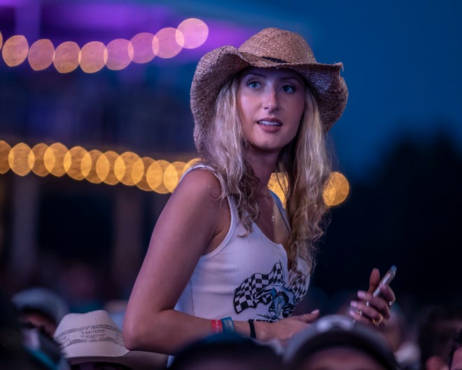 Concert-goers listen to Luke Combs during the Faster Horses music festival on July 16, 2021, in Brooklyn.