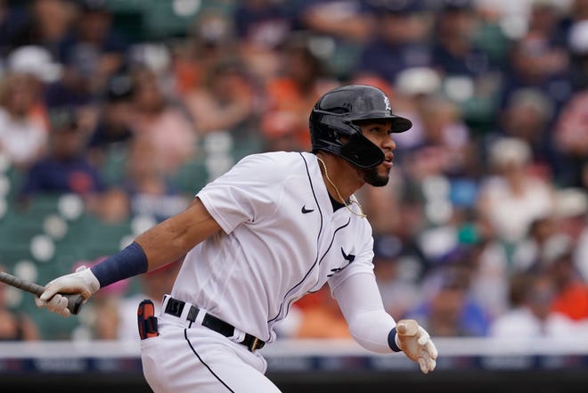 The Tigers' Victor Reyes watches his solo home run during the fourth inning.