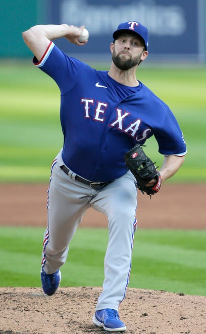 Rangers' Jordan Lyles pitches in the second inning.