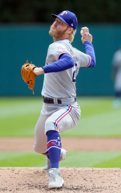 The Rangers' Mike Foltynewicz pitches in the third inning.