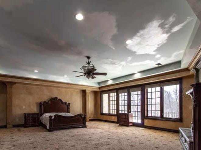 Clouds on the ceiling in this bedroom.