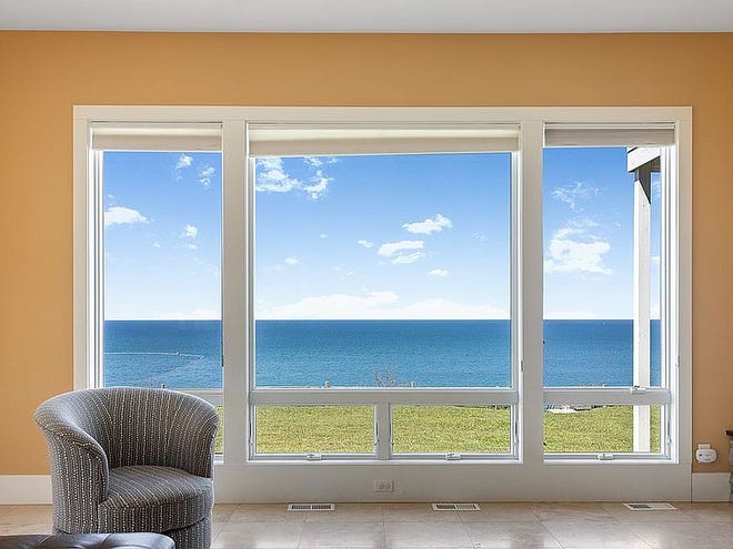 Spacious beach house features 6 bedrooms, 4 1/2 baths and boasts amazing water views, including the main level Master Suite and upstairs En Suite. Master bath features tile, granite, double sinks, walk-in shower with two shower heads, soaking tub and heated floors.