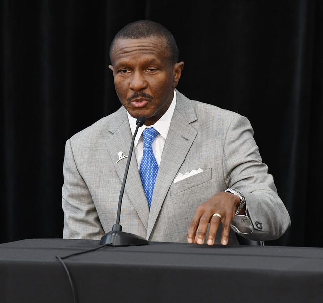 Pistons head coach Dwane Casey, answers questions from reporters during the Pistons introductory press conference .