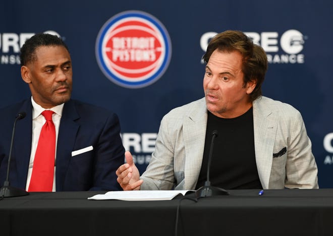 Pistons owner Tom Gores, (r), with Troy Weaver, General Manager, gives his remarks during the press conference.