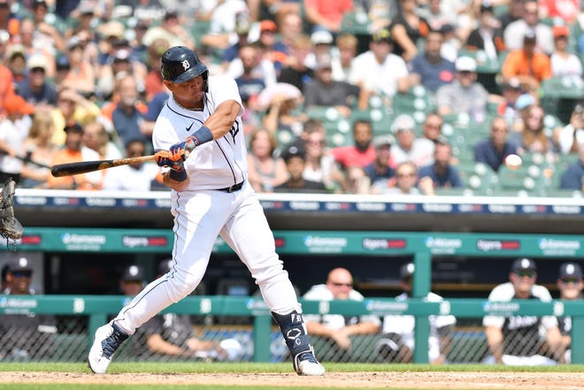 Tigers designated hitter Miguel Cabrera hits a sacrifice fly in the sixth inning.